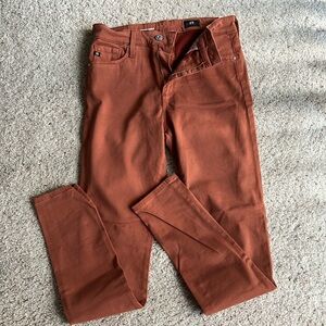 Beautiful rust colored The Farrah Skinny Ankle size 26 by AG.